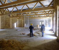 Chantier ossature en bois remplie de paille 